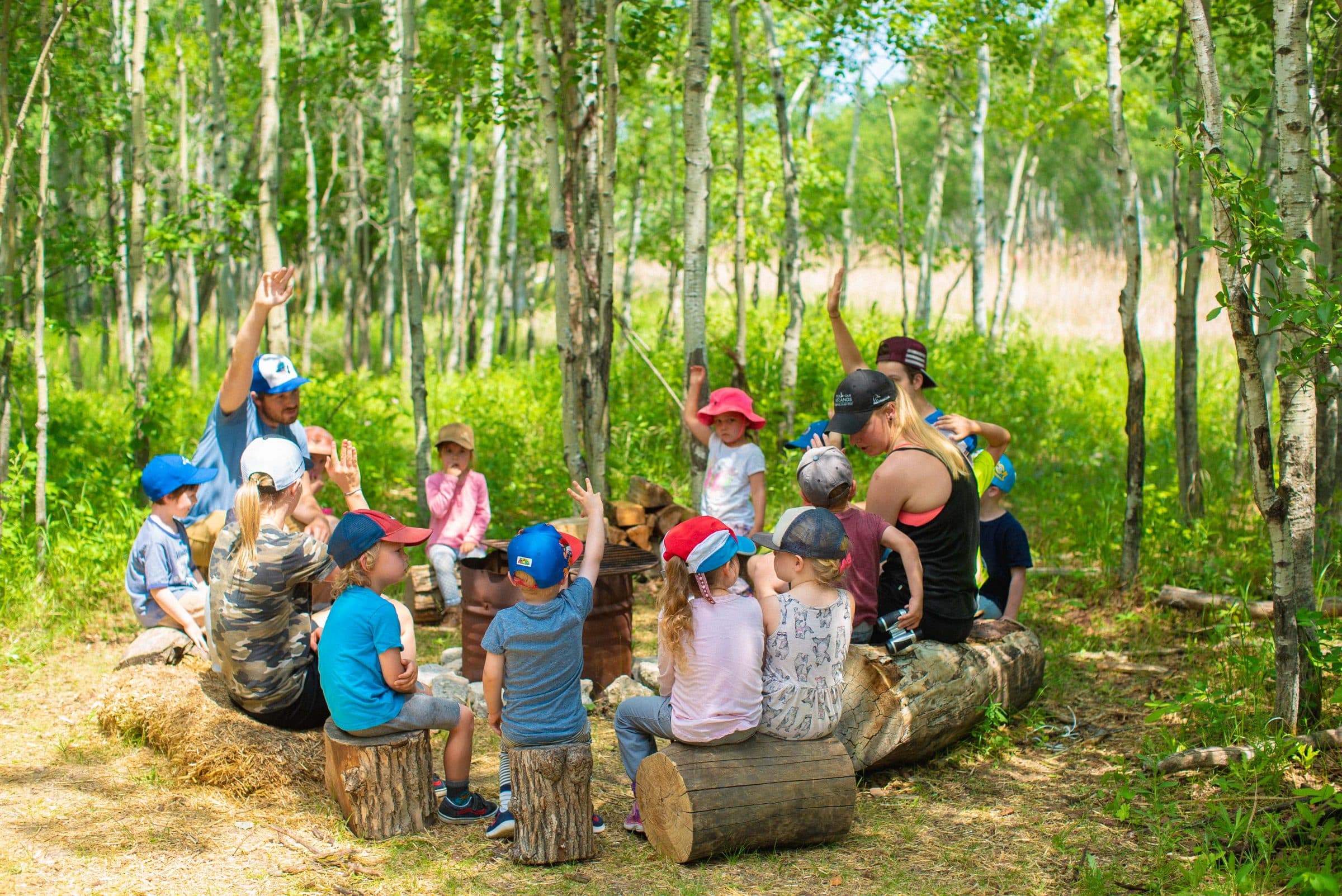 A group of children around a campfire