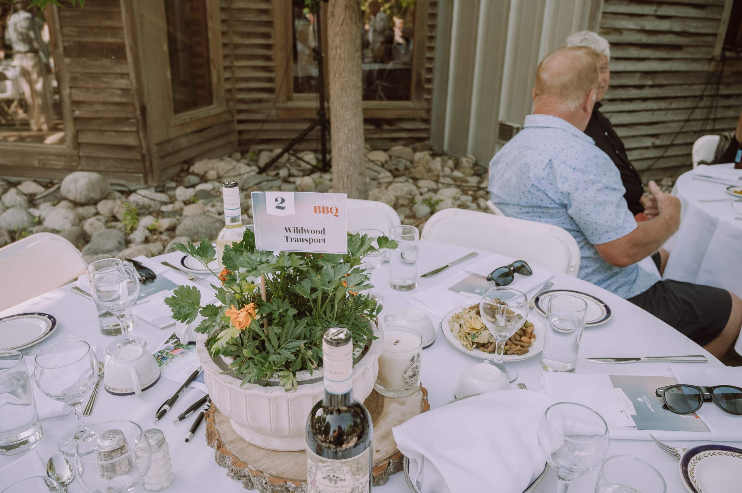 Flowerpot centrepiece on set table