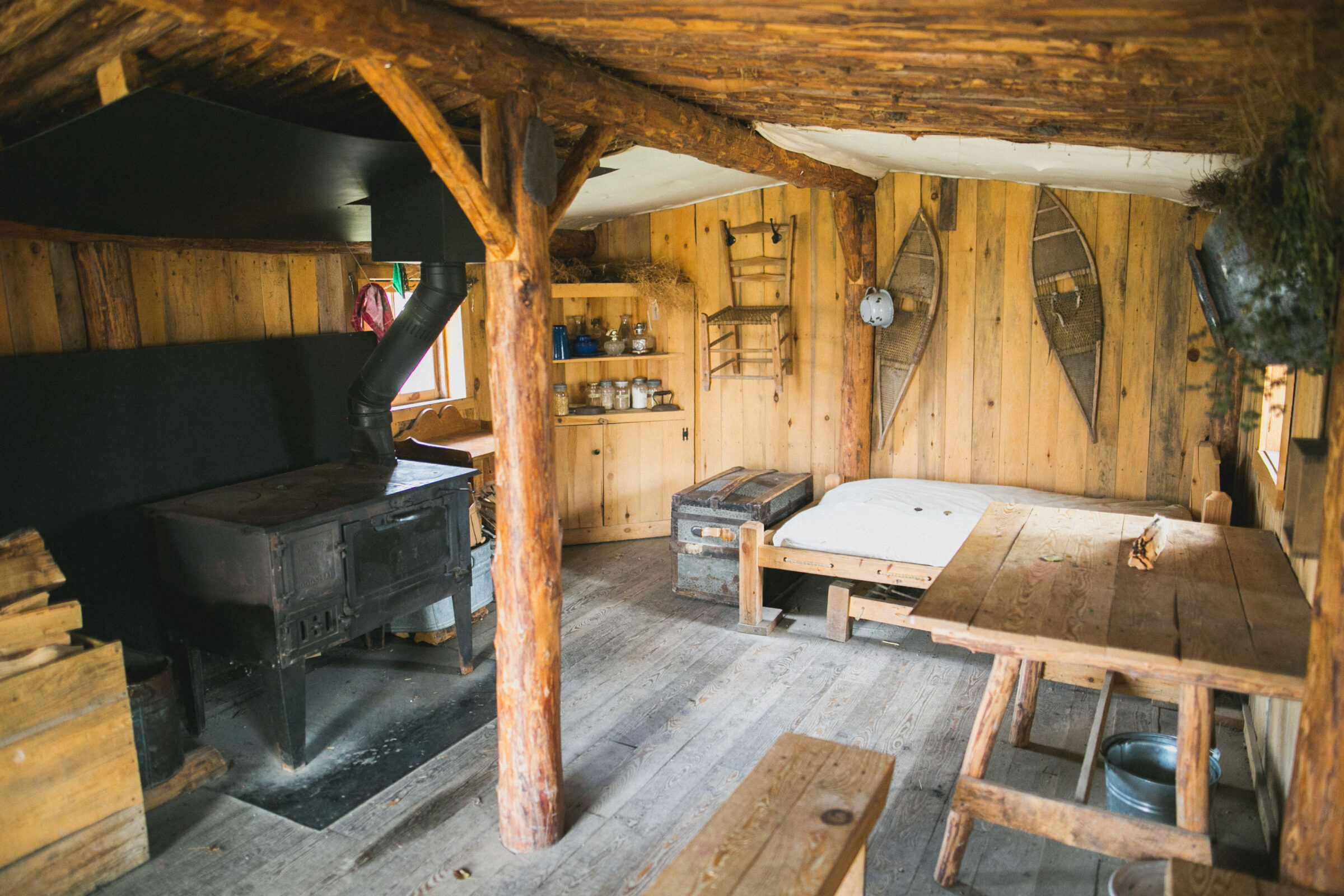 Inside of Sod House with hay bed and wood burning stove